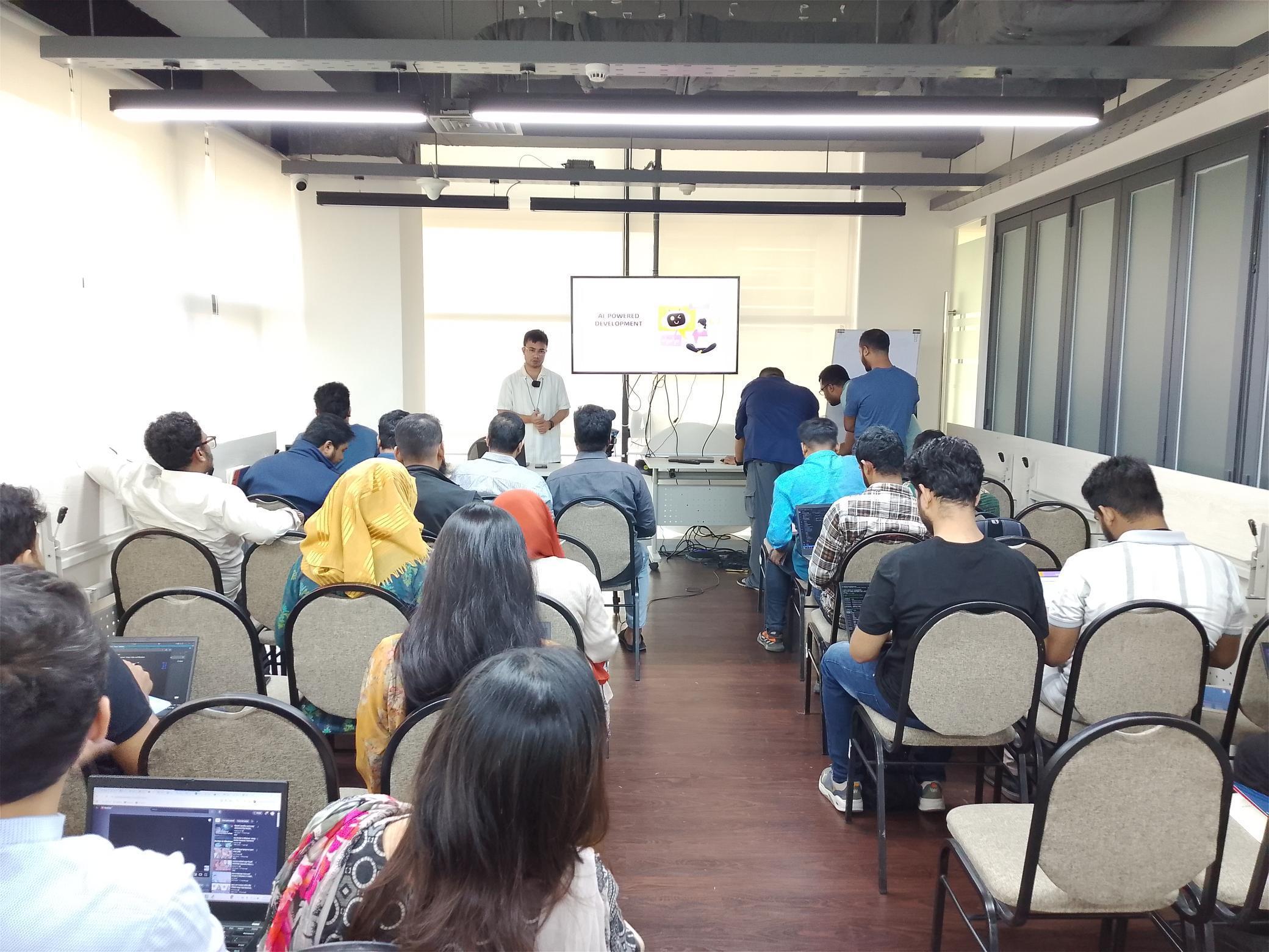 Conducting a training session at BRAC IT